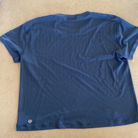 Lululemon Train to Be Short Sleeve
Ink Blue Perforated Crop Tee - Picture 6 of 7